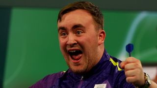 LONDON, ENGLAND - DECEMBER 21: Luke Littler of England celebrates after winning his match on Day Seven of the 2023/24 Paddy Power World Darts Championship at Alexandra Palace on December 21, 2023 in London, England. (Photo by Andrew Redington/Getty Images)