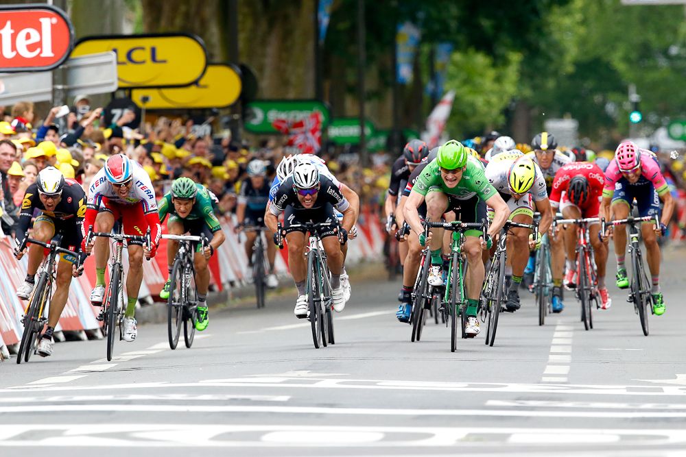 Andre Greipel surges past Mark Cavendish to win stage 5.