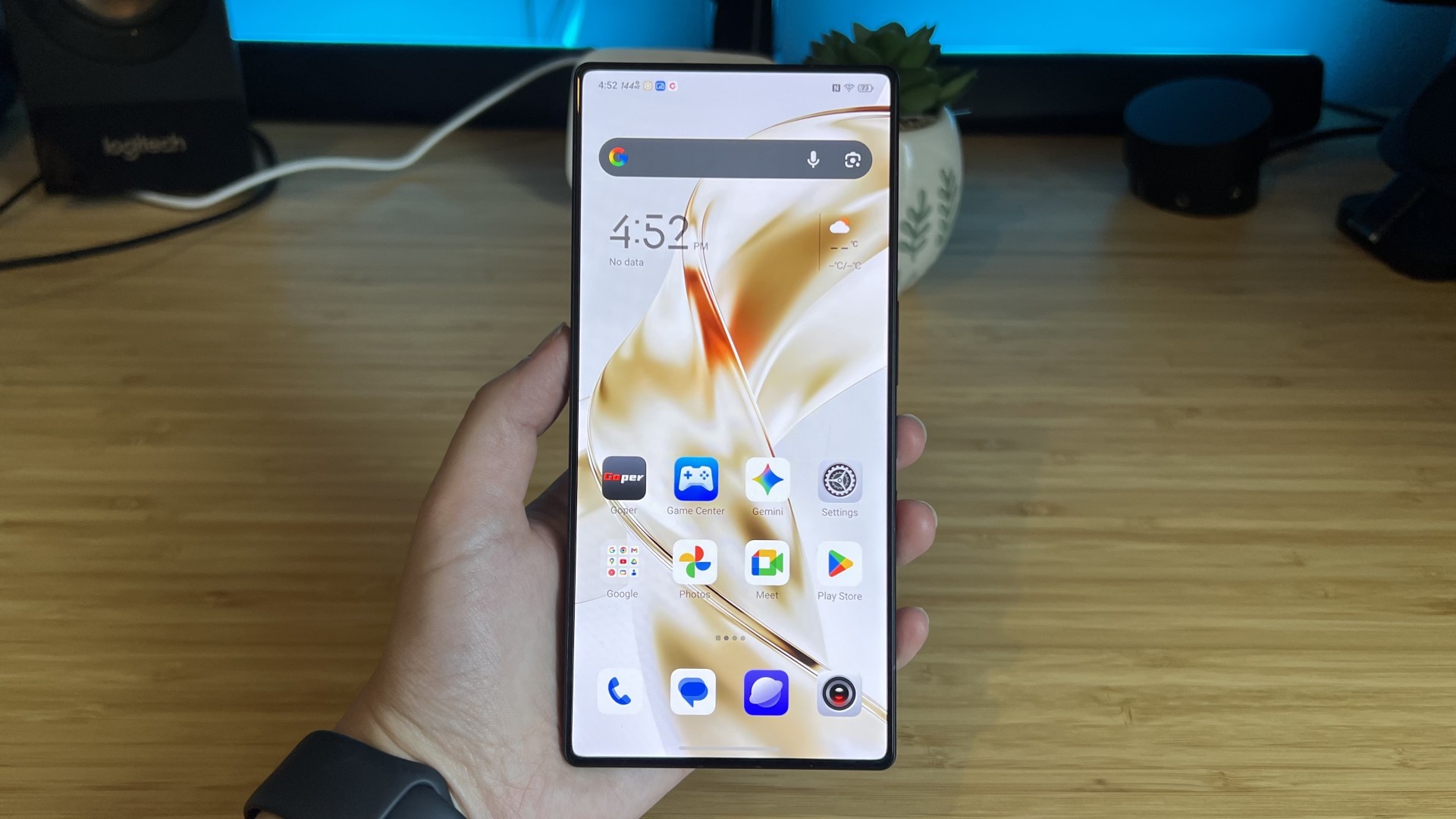 RedMagic 11S Pro gaming phone showing home screen in a reviewer's hand