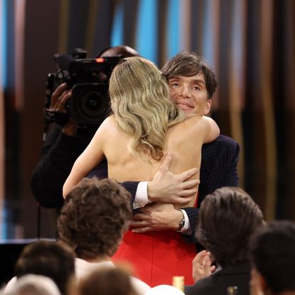 Emily Blunt hugs Cillian Murphy at the 2024 SAG Awards