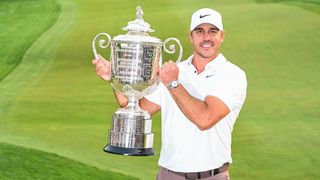 Brooks Koepka with the trophy after winning the PGA Championship at Oak Hill