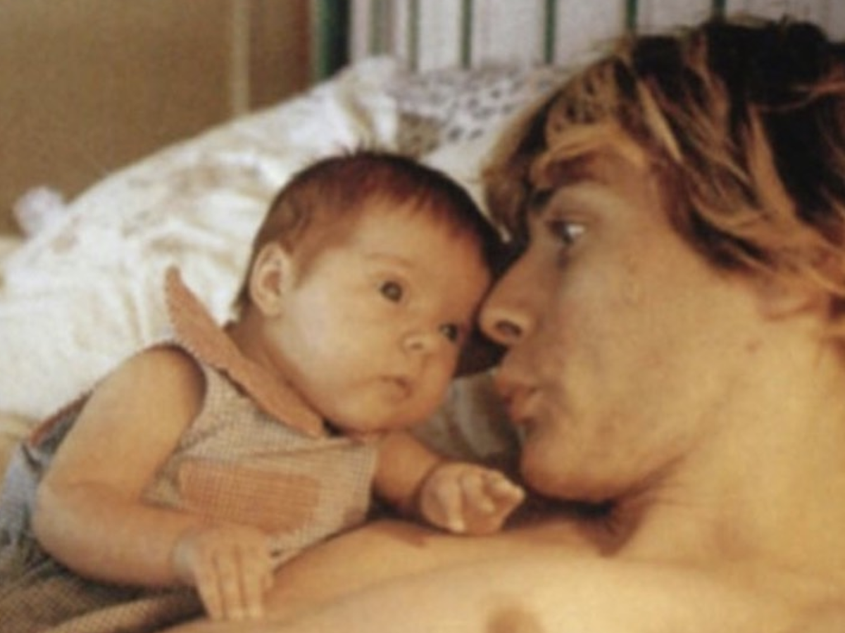 A picture of an infant Frances Bean Cobain with her father Kurt