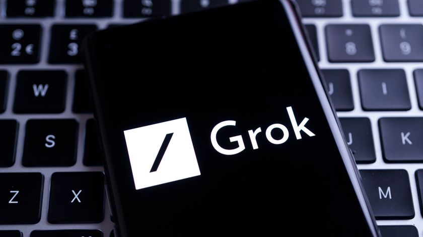 Grok logo on a phone handset on a keyboard