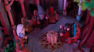 The Council of Elrond takes their seats in the iconic courtyard of the Lego Rivendell set, with the One Ring on the plinth