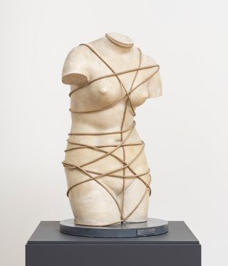 Man Ray sculpture of torso bound in rope