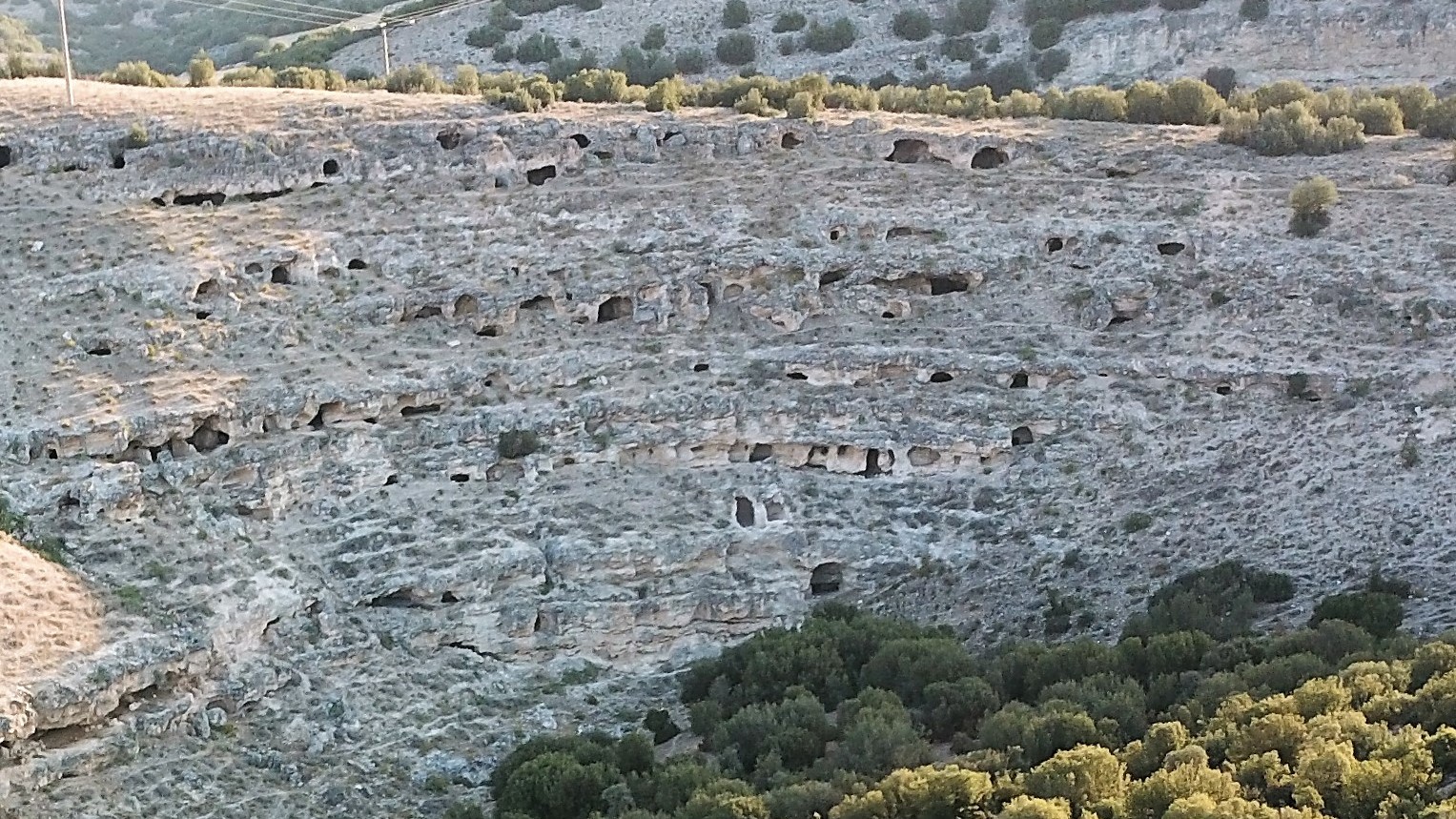 A view of the northeastern necropolis in the canyon wall.