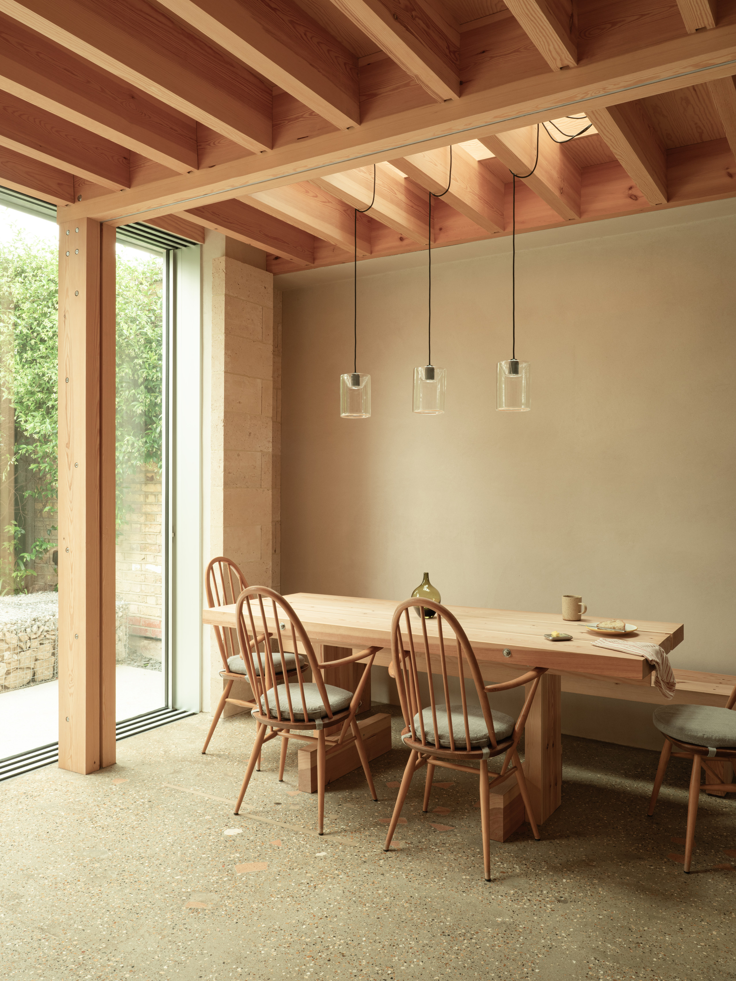 The timber frame is exposed throughout