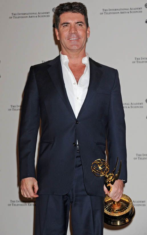 Cowell takes aim at Elton and Paul Weller (VIDEO)