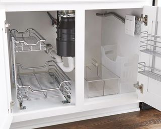Under kitchen sink storage with U-bend in show