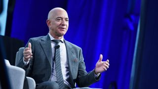 Amazon founder Jeff Bezos with blue background