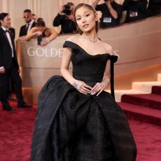 ariana grande wears a black dress at the 2026 golden globes