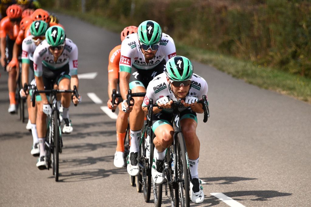 The pack rides during the 12th stage of the 107th edition of the Tour de France cycling race 218 km between Chauvigny and Sarran on September 10 2020 Photo by AnneChristine POUJOULAT AFP Photo by ANNECHRISTINE POUJOULATAFP via Getty Images