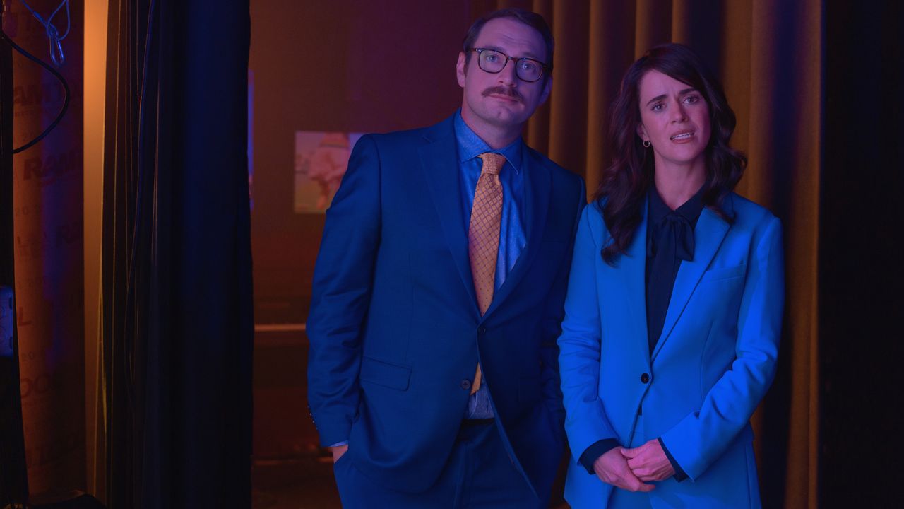 Brandon Scott Jones as Mr. T and Mary Holland as Martha in Netflix's Senior Year