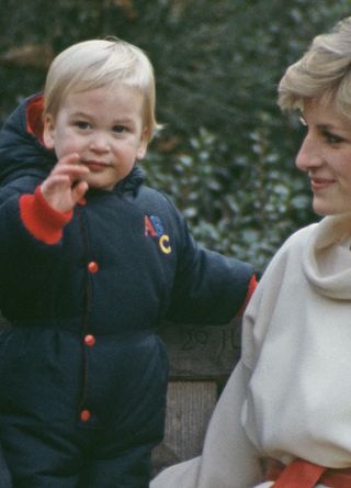 Prince William (aged one) waving to the cameras with Princess Diana