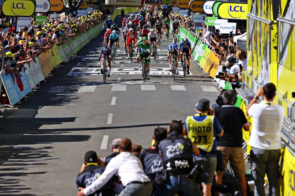 CARCASSONNE FRANCE JULY 09 Jasper Philipsen of Belgium and Team AlpecinFenix Mark Cavendish of The United Kingdom Green Points Jersey Celebration Michael Mrkv of Denmark and Team Deceuninck QuickStep Ivn Garca Cortina of Spain and Movistar Team sprint at arrival during the 108th Tour de France 2021 Stage 13 a 2199km stage from Nmes to Carcassonne Photographers LeTour TDF2021 on July 09 2021 in Carcassonne France Photo by Tim de WaeleGetty Images