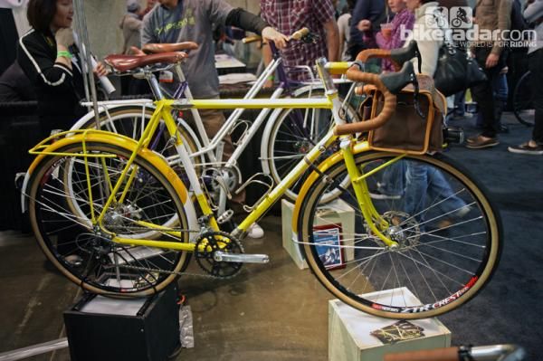 This Yipsan touring bike only got more interesting the more you looked at it with novel front shifter positioning (it's on the seat tube), S&amp;S couplers, 650b wheels and tires, custom front and rear racks, and a custom lugged stem.