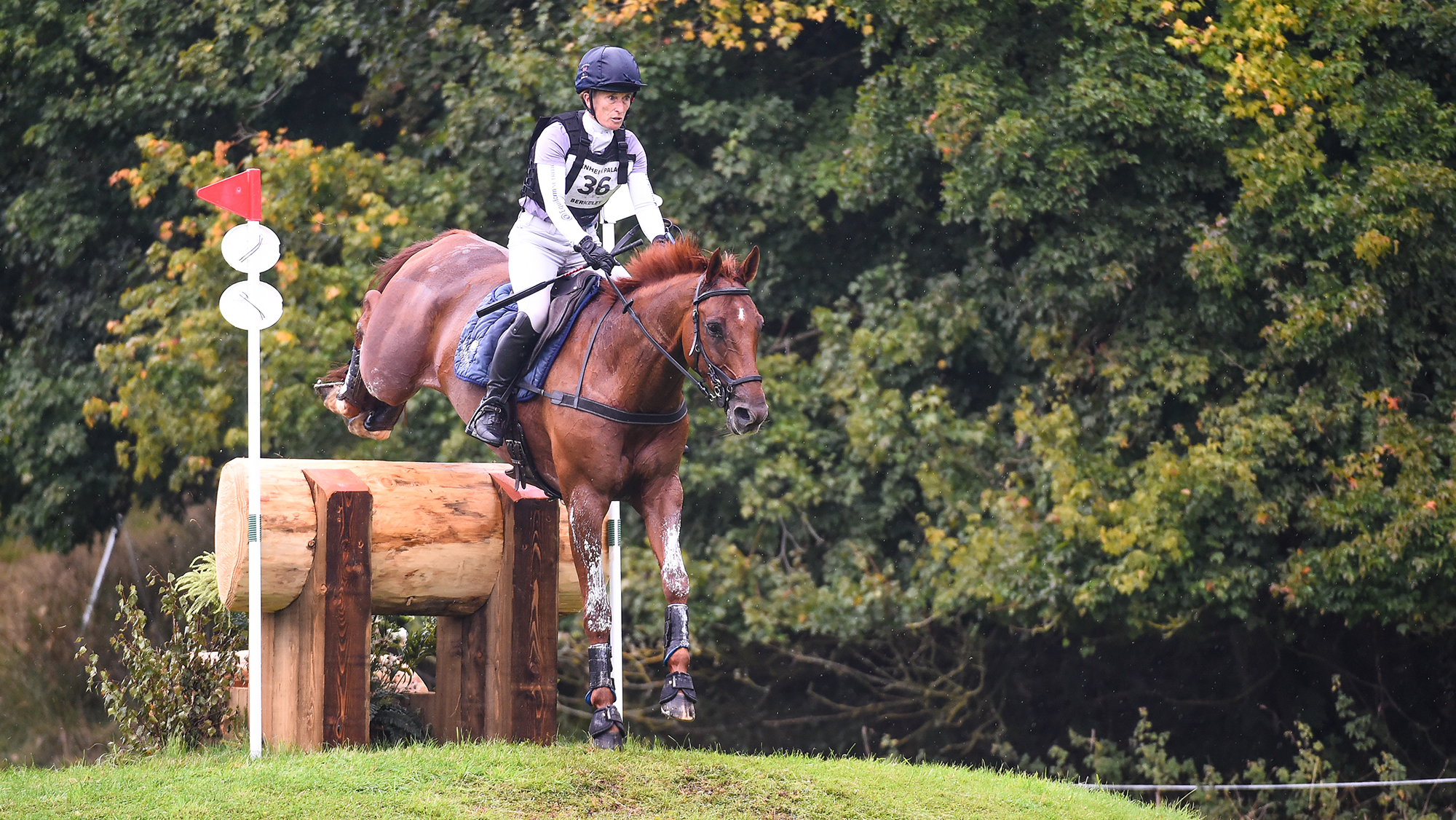 Daisy Berkeley and Diese Du Figuier jump a cross-country fence at Blenheim 2024.