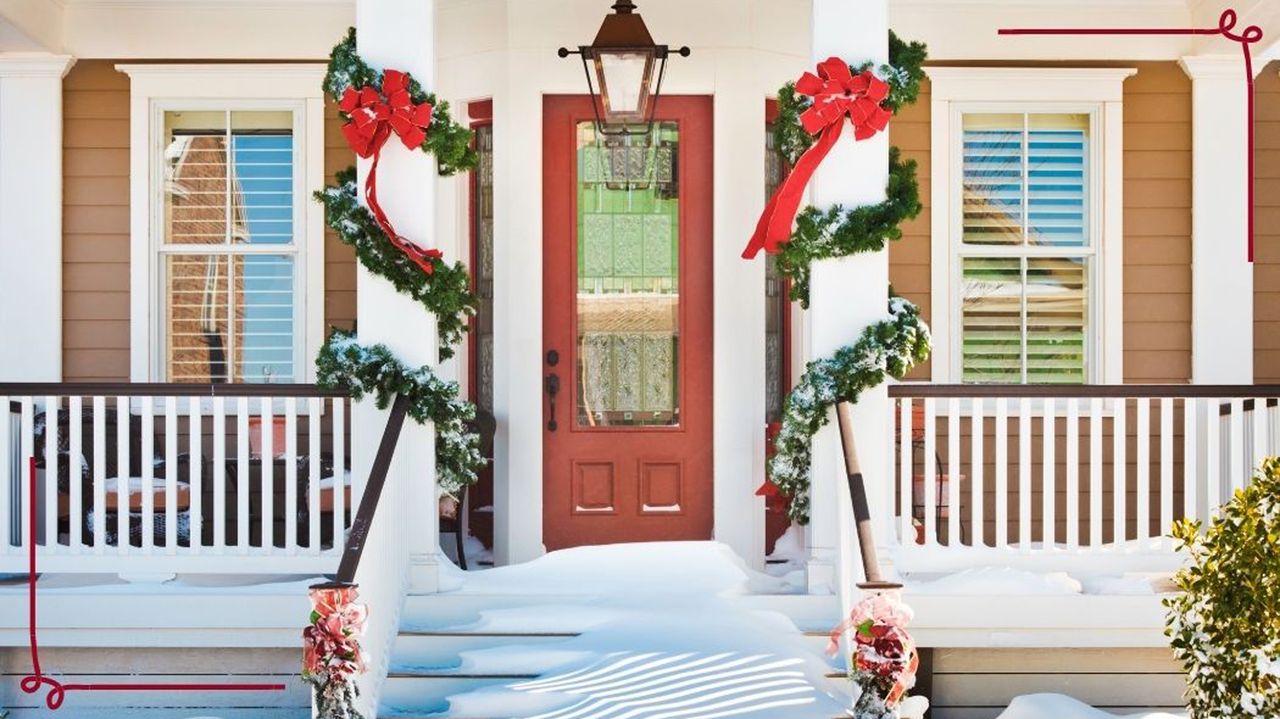 inviting festive front door with snow on the porch with garlands and light outdoor Christmas decorating ideas