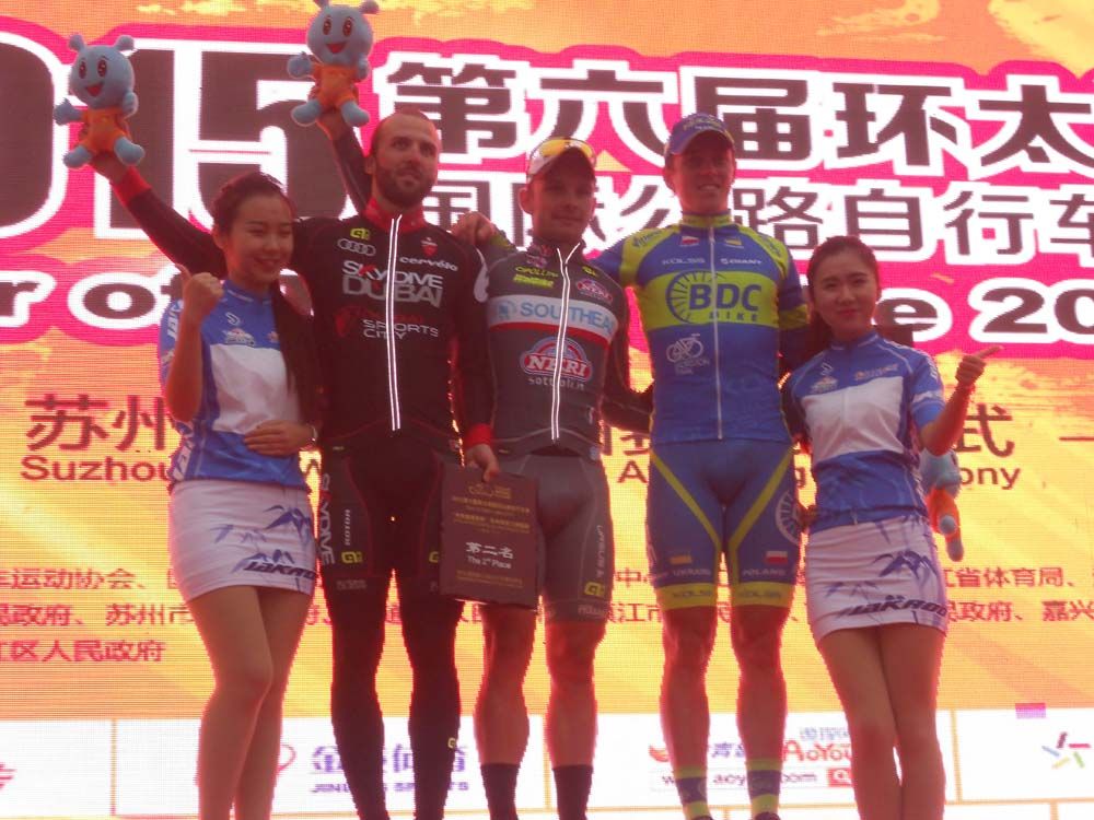 Jakub Mareczko takes centre stage on the final podium at the Tour of Taihu Lake