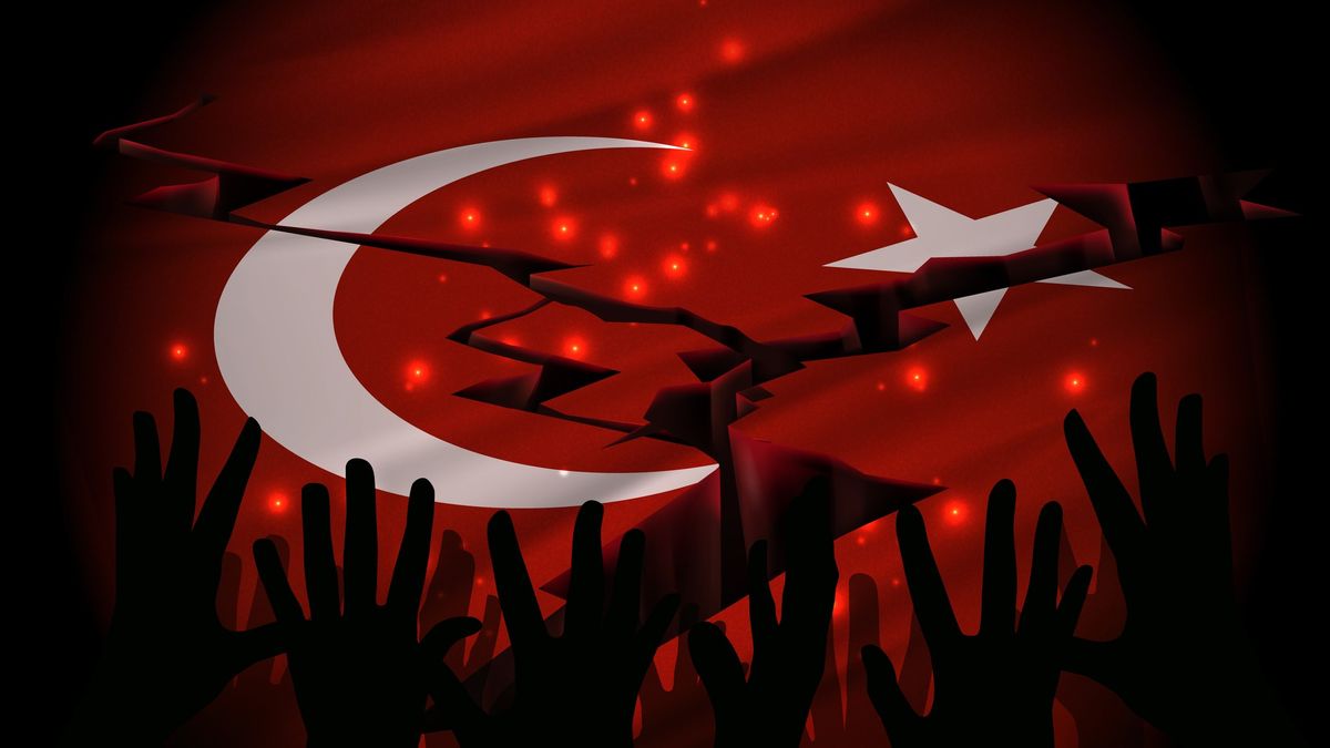 The epicenter of the earthquake in Turkey on a Turkey flag. Shadows of hands asking for help