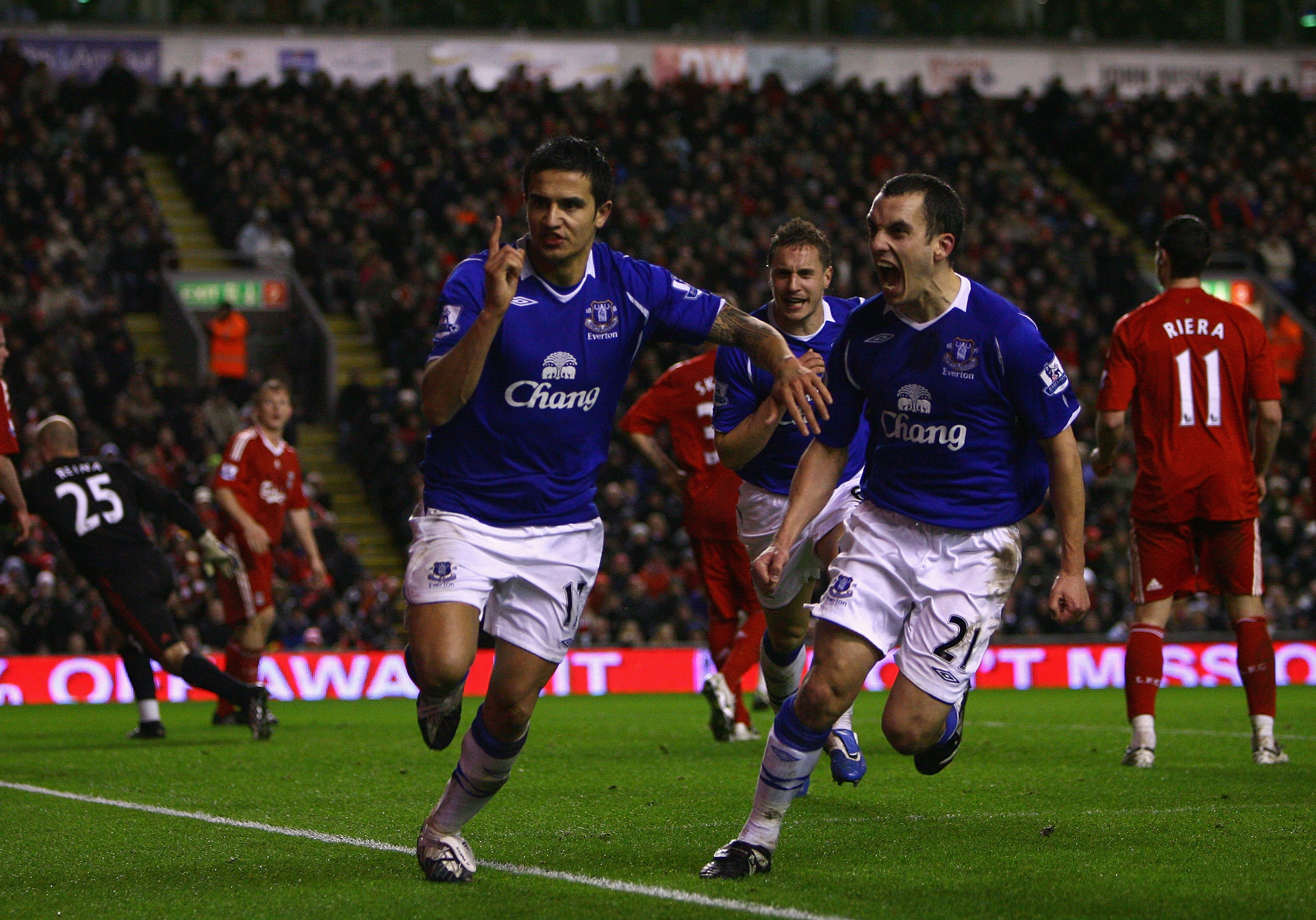 Tim Cahill celebrates with Leon Osman after scoring a late equaliser for Everton against Liverpool at Anfield in January 2009.