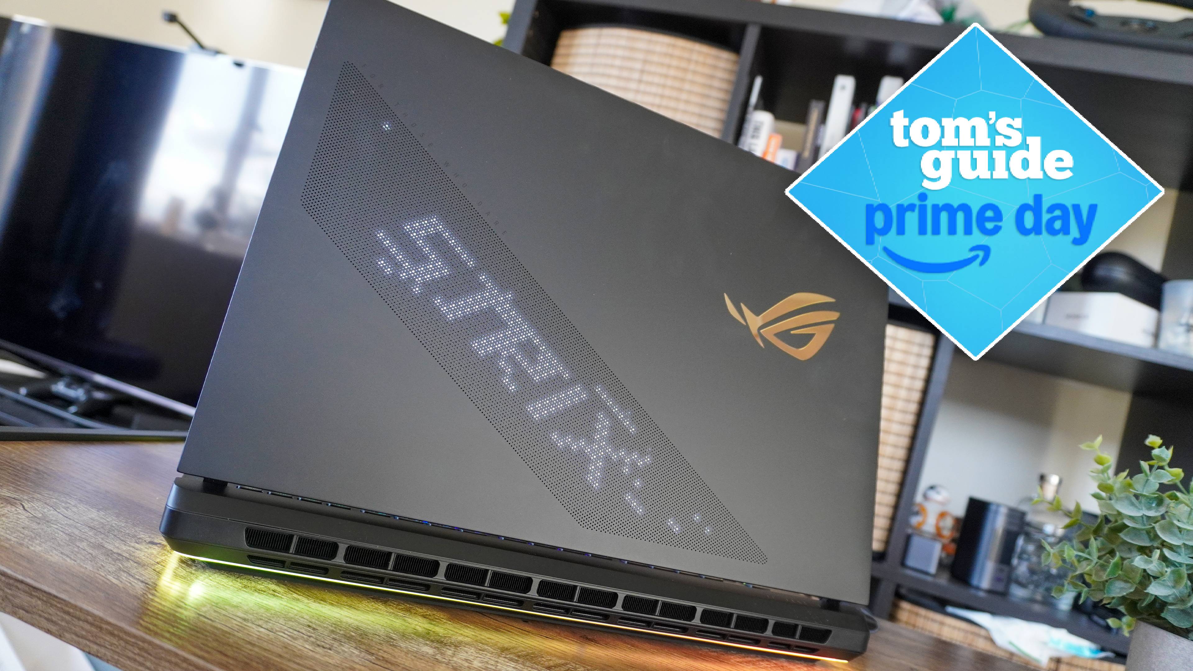 Asus ROG Strix on table showing lid with Tom's Guide Prime Day badge