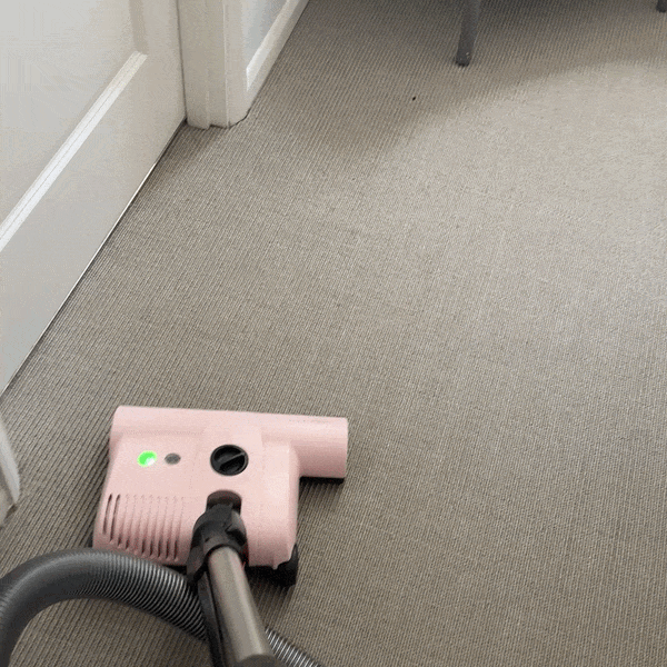 Sebo Airbelt 3 Premium Pastel Pink 2, a Reader Approved Awards cleaning category winner, cleaning the floor in a tester&rsquo;s home.