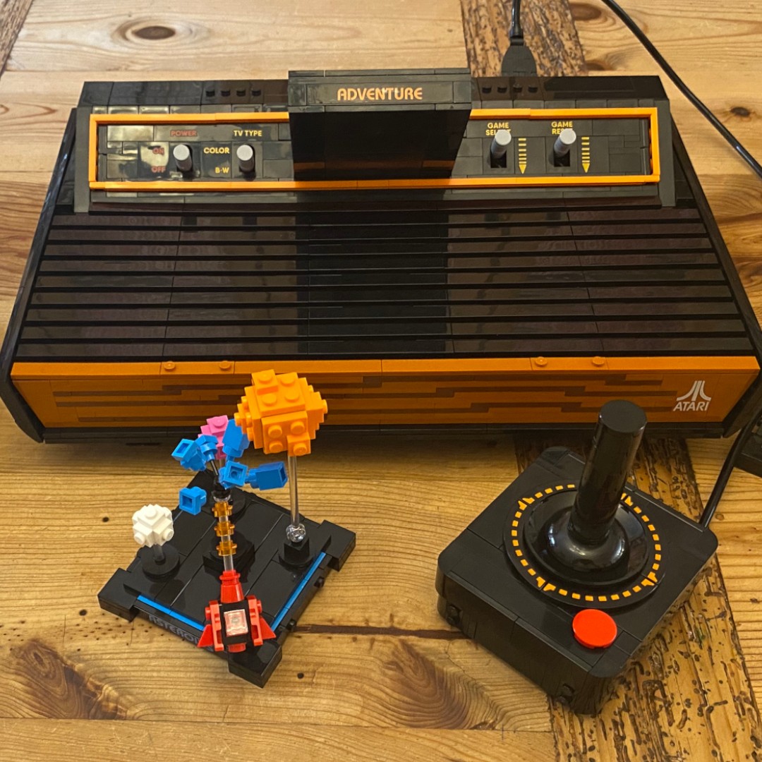 Lego Atari 2600 on a wooden bench
