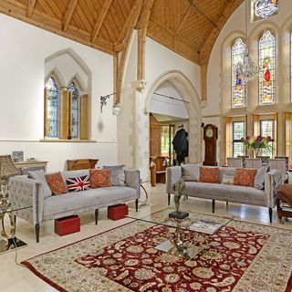 church house with vaulted ceiling and stained glass windows