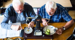 Judges weigh a giant gooseberry at the Egton Bridge Gooseberry Show in the North Yorkshire Moors. The show is the oldest surviving Gooseberry show in the country, established in 1800.