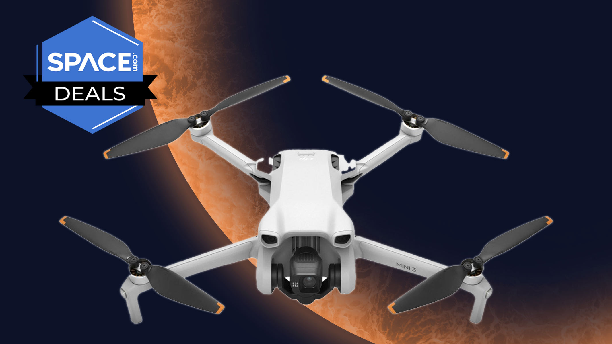 DJI Mini 3 drone in front of an orange planet background with a sticker in the top left corner showing space.com's logo