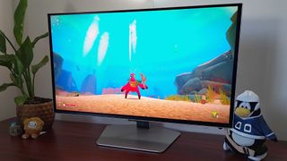 Samsung Odyssey OLED G6 with Another Crab's Treasure gameplay on screen