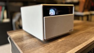 XGIMI Horizon Ultra projector on a wooden table