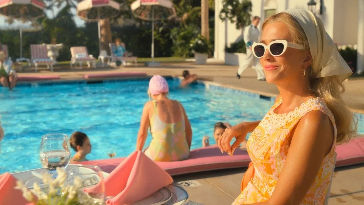 Kristen Wiig by the pool in Palm Royale