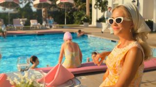 Kristen Wiig by the pool in Palm Royale
