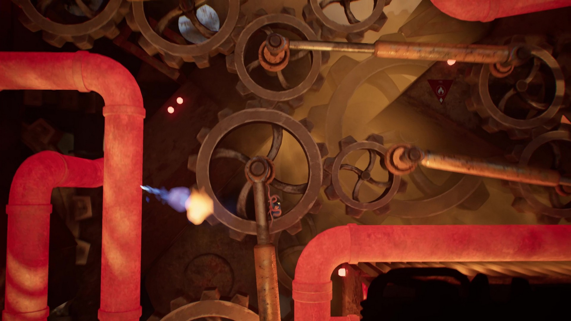 Darwin crawls along pistons as nearby gears turn and red hot pipes erupt with steam in Darwin's Paradox