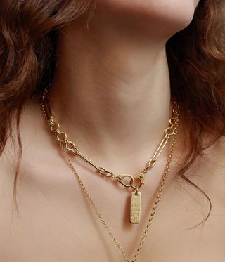 gold medallion jewellery made using FoundRae Ingot Program, seen on woman's neck