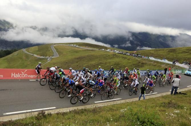 The Vuelta a Espana peloton in action during stage 15 in the Pyrenees
