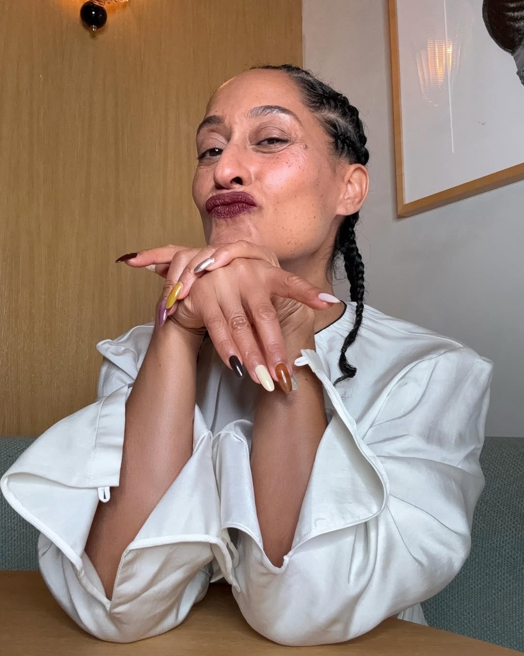 Tracee Ellis Ross with a mismatched manicure