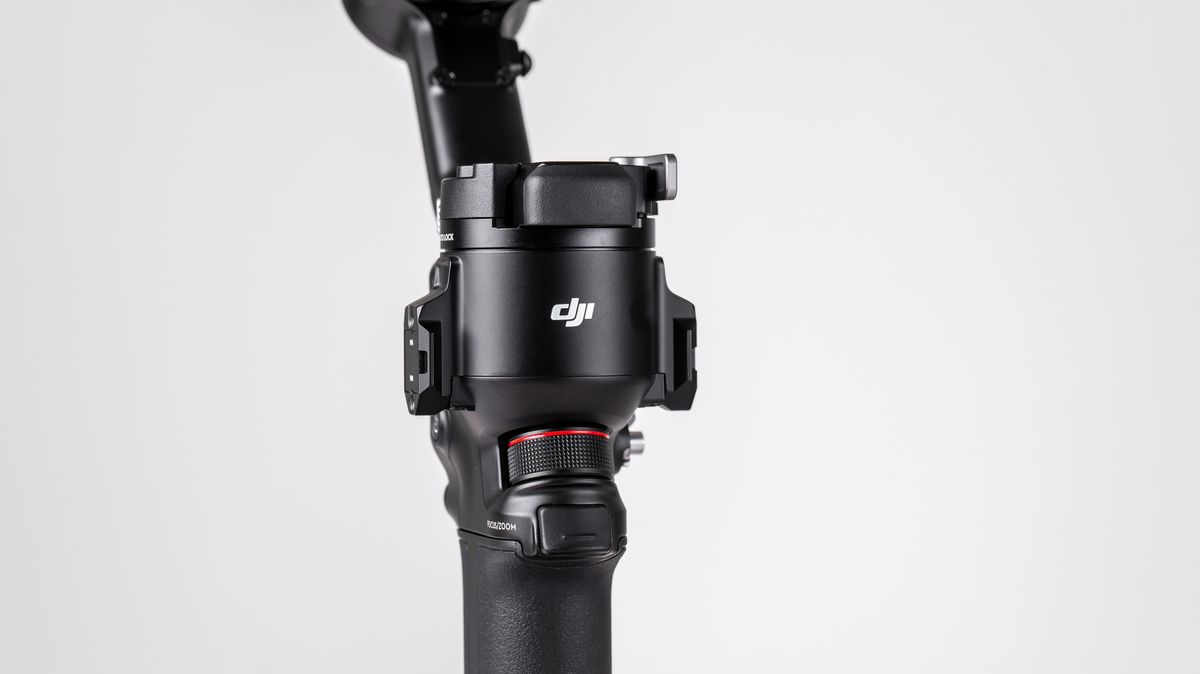DJI RS 4 gimbal on a off-white background