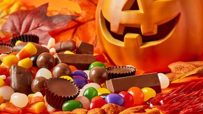 Halloween candy and a jack-o'-lantern