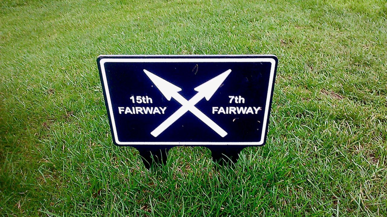 A helpful fairway sign at Langland Bay Golf Club