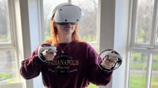 A person playing the PlayStation VR 2.