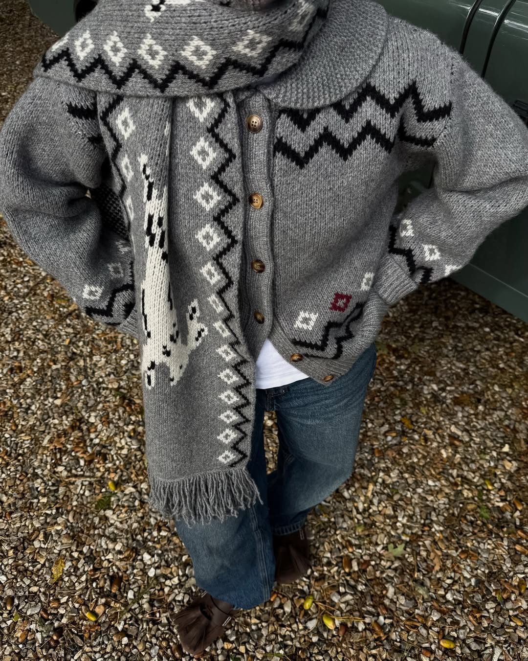 Influencer Rebecca Ferrzwyatt wearing a scarf cardigan.