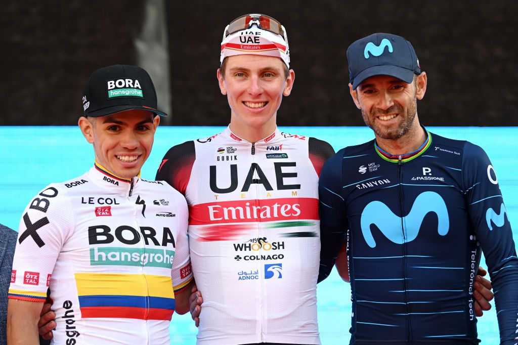 VARESE ITALY OCTOBER 04 LR Sergio Andres Higuita Garcia of Colombia and Bora Hansgrohe Team on second place race winner Tadej Pogacar of Slovenia and UAE Team Emirates and Alejandro Valverde Belmonte of Spain and Movistar Team on third place pose on the podium ceremony after the 101st Tre Valli Varesine 2022 a 1963km one day race from Busto Arsizio to Varese 377m TreValliVaresine on October 04 2022 in Varese Italy Photo by Dario BelingheriGetty Images