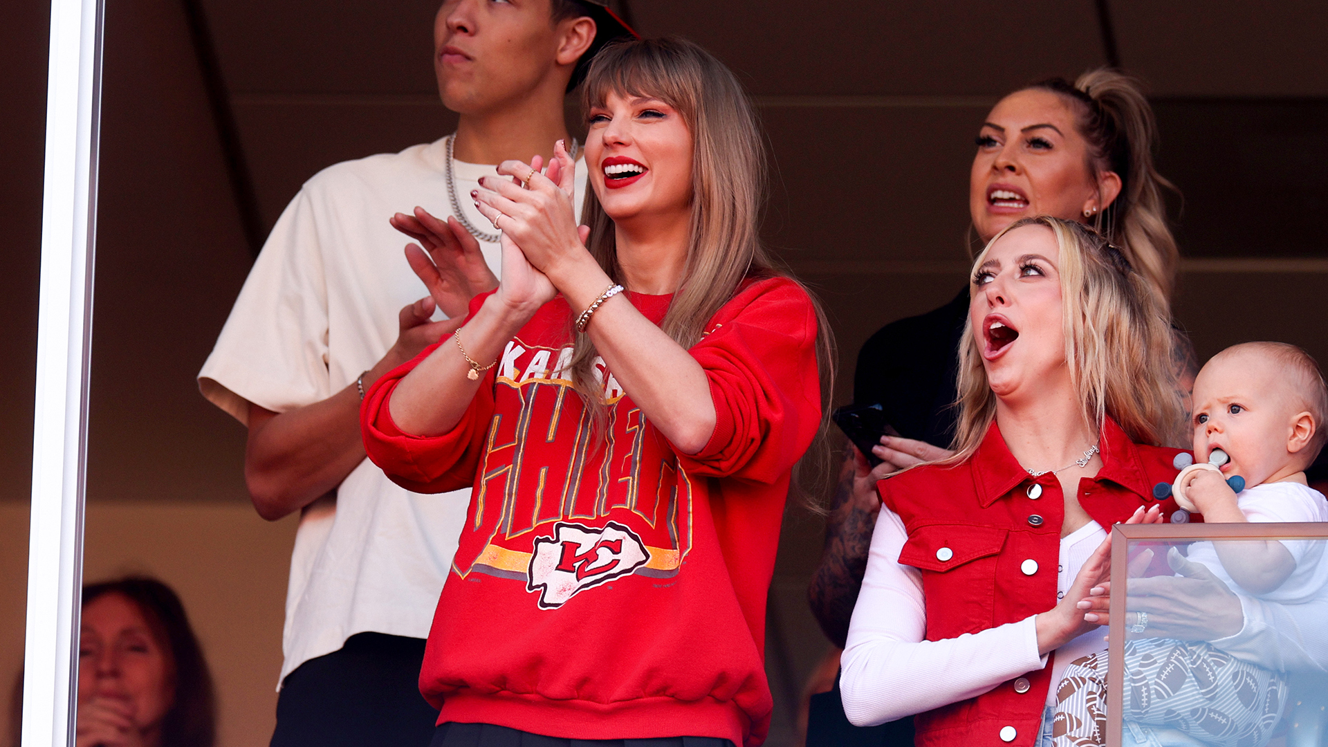 KANSAS CITY, MISSOURI - OCTOBER 22: Taylor Swift and Brittany Mahomes react during a game between the Los Angeles Chargers and Kansas City Chiefs at GEHA Field at Arrowhead Stadium on October 22, 2023 in Kansas City, Missouri. (Photo by Jamie Squire/Getty Images)