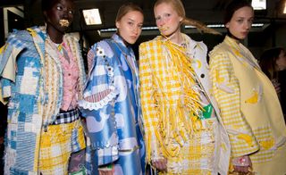 Models wear blue and white coat with pink top and yellow gingham skirt, wales printed blue coat, and yellow gingham jackets and skirts