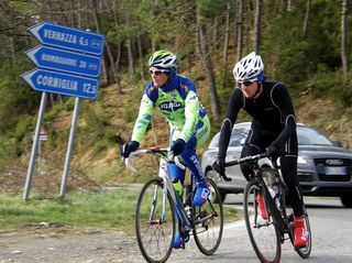 Team Liquigas' Ivan Basso and ex-professional Michele Bartoli ride in Liguria, Italy,