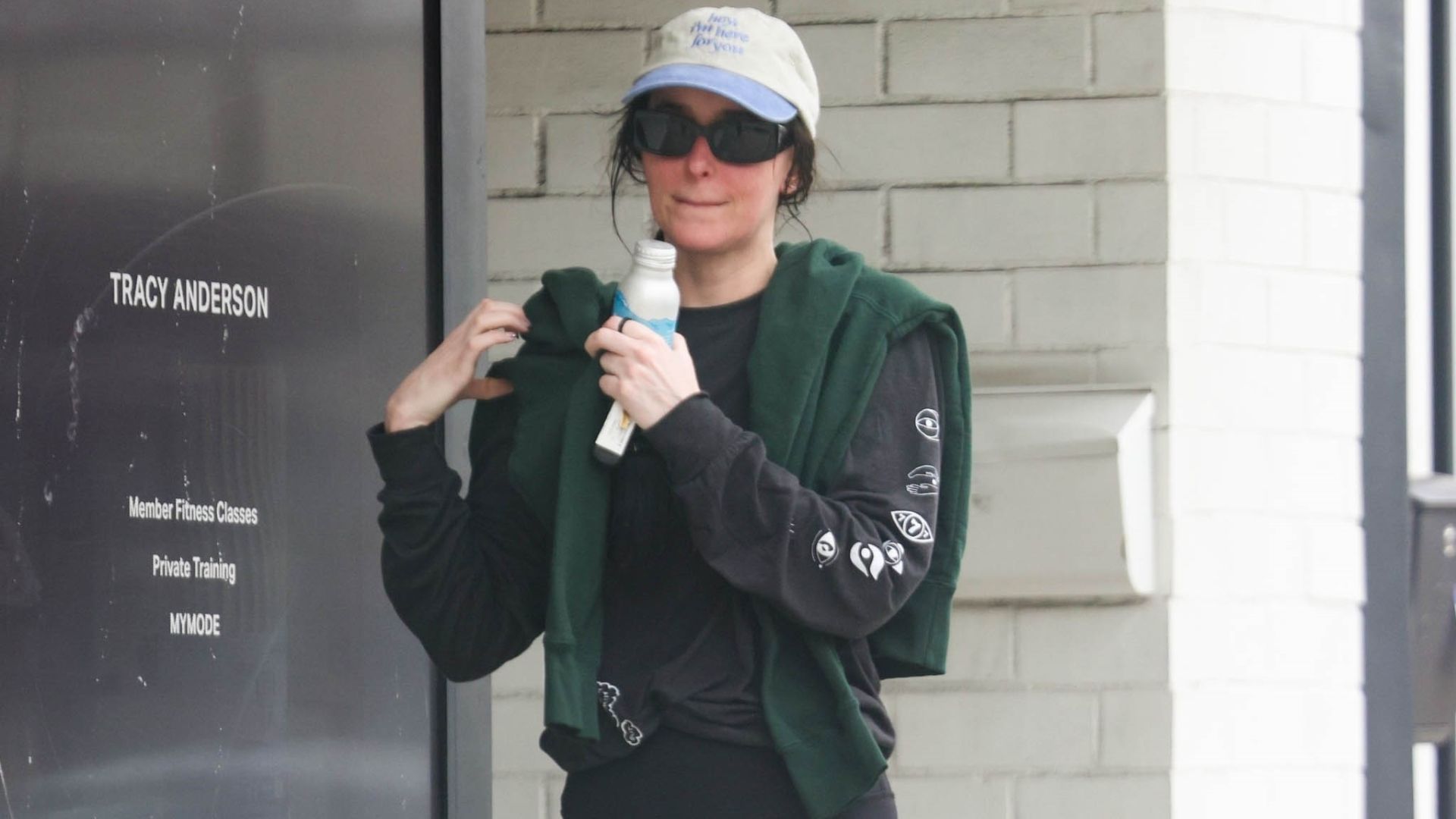 Dakota Johnson Simply Wore Her Leggings With Traditional Black Trainers