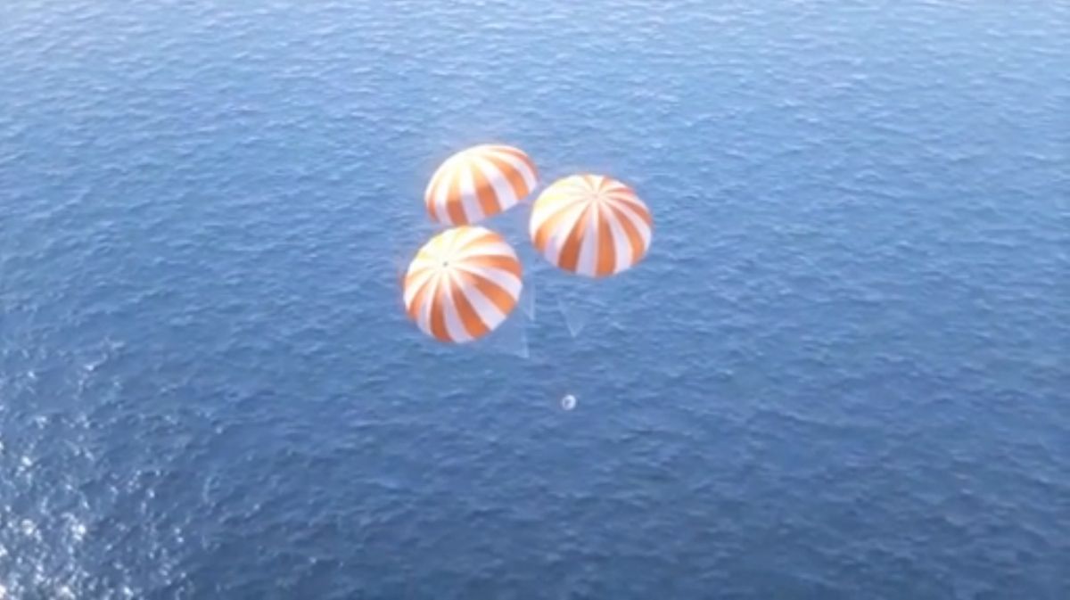 This upcoming Sunday (Aug. 2, 2020) NASA will attempt its first ocean splashdown in nearly 45 years with SpaceX&#039;s Demo-2 mission. This still from a NASA video shows an Orion spacecraft about splashing down after visiting an asteroid parked in orbit around the moon during the Asteroid Retrieval and Utilization mission. 